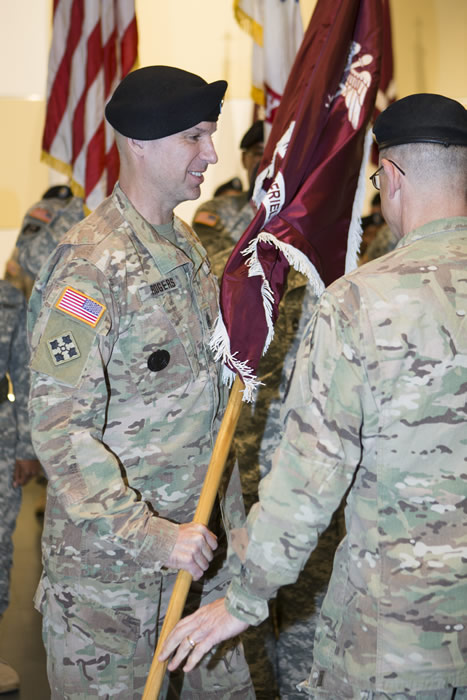 Command Sgt. Maj. David M. Rogers (left) during a change of responsibility ceremony