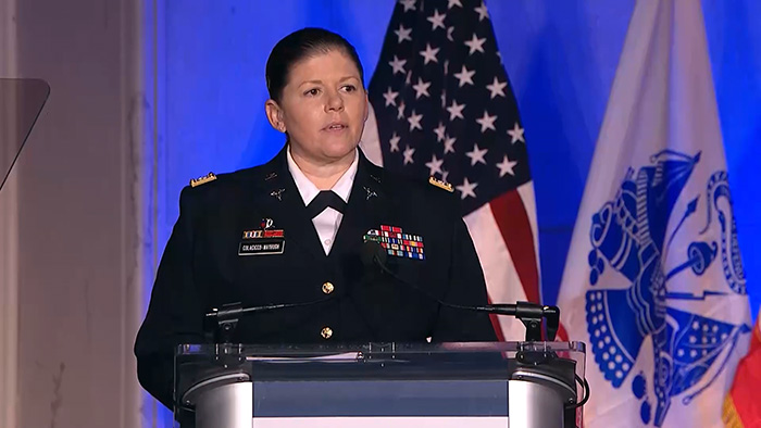 Lt. Col. Michelle Colacicco-Mayhugh delivers remarks