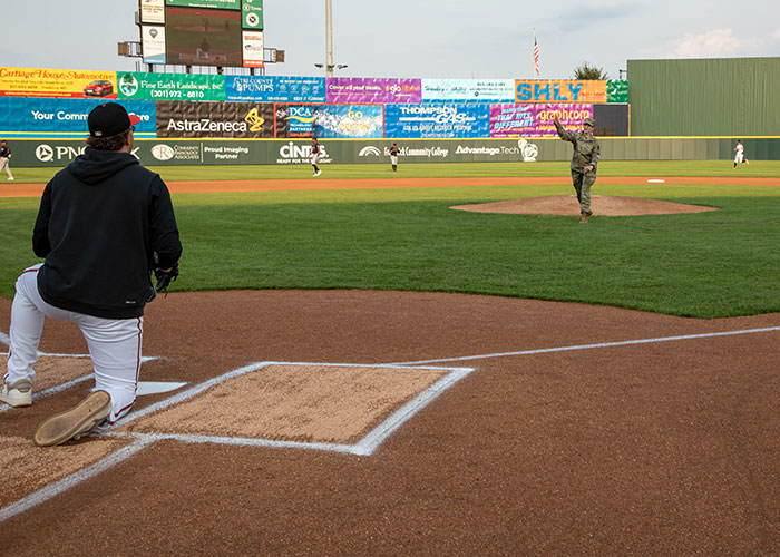 BG Jenkins delivers the first pitch