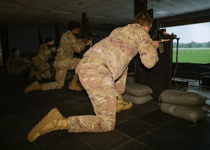 soldiers firing rifles on a range