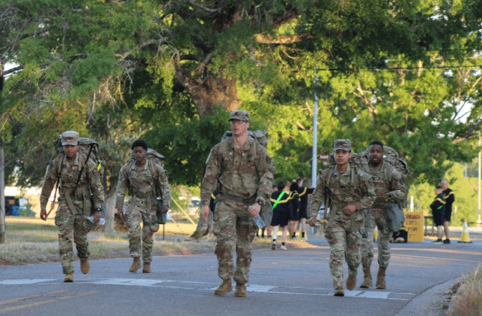 Soldiers marching with ruck sacks