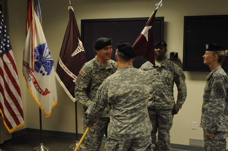 Lt. Col. Richard P. Duncan is passed the USACEHR flag