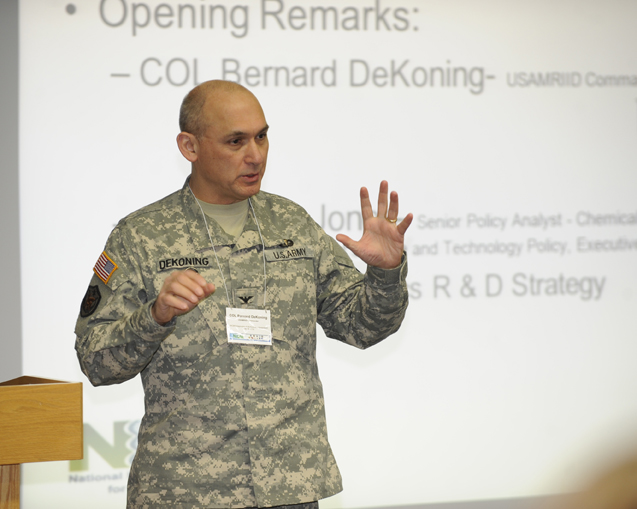 Col. Bernard L. DeKoning kicks off the NICBR symposium Feb. 16 with opening remarks