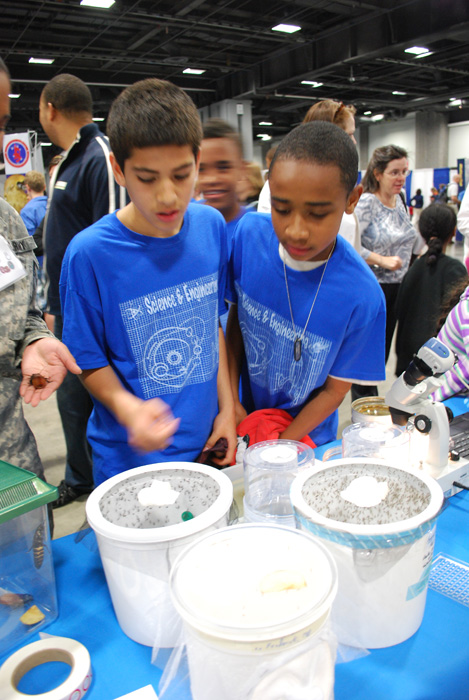 Future scientists and engineers check out the USAMRMC demonstrations at 2013 Junior Science & Humanities Symposium