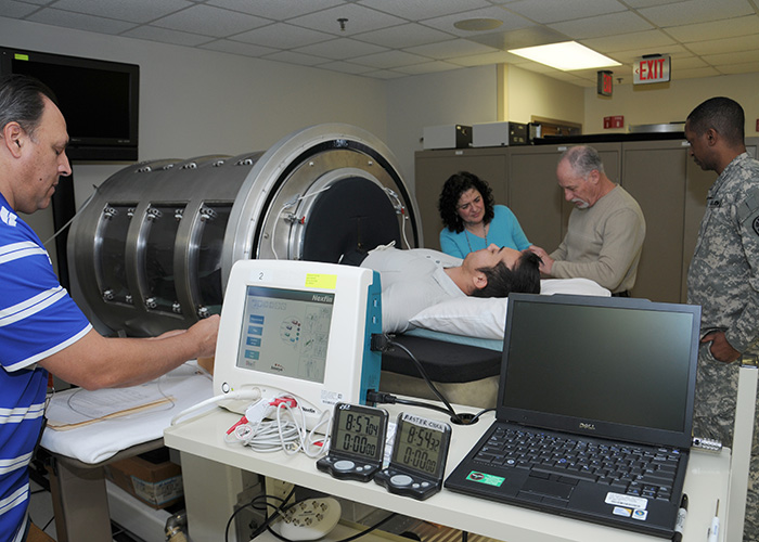 Monitor placed on a volunteer in the lower body negative pressure chamber