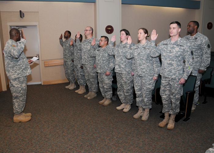 Newly-inducted non-commissioned officers recite The Creed of the NCO