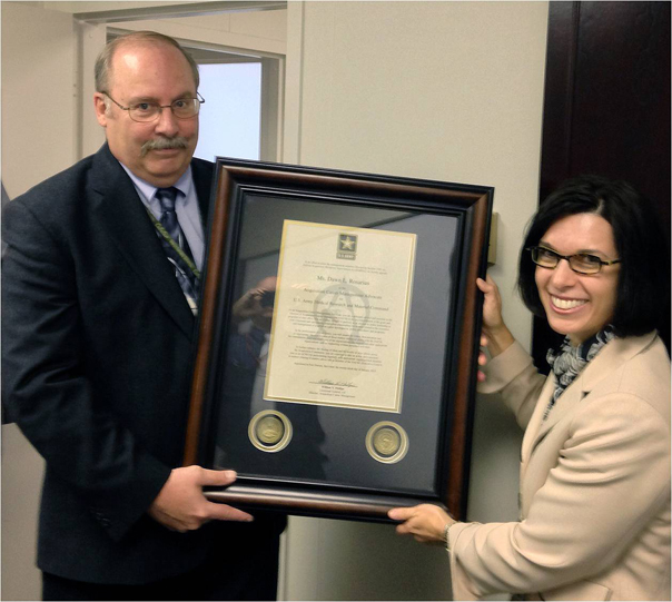 Tom Evans presents Dawn L. Rosarius with her official charter