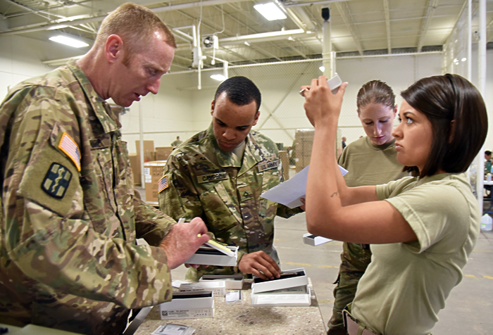 Soldiers from the 10th Combat Support Hospital inventory new medical equipment