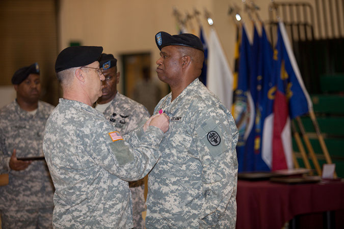 Maj. Gen. James K. Gilman pins medal on Col. Isiah M. Harper, Jr.