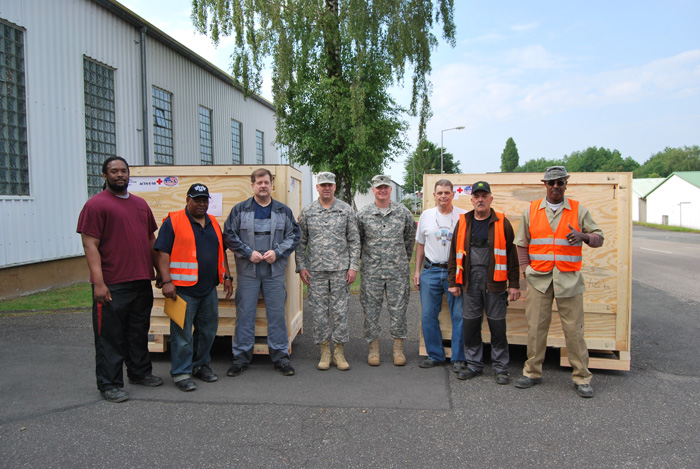 Workers with the U.S. Army Medical Materiel Center, Europe's Humanitarian Assistance Program Division