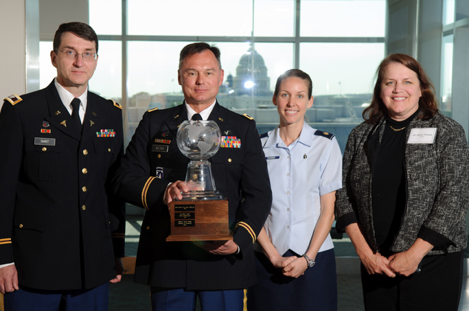 Colonel Colin Ohrt, Colonel Peter Weina, Major Jessica Cowden and Dr. Debra Yourick with the Malaria Action Award