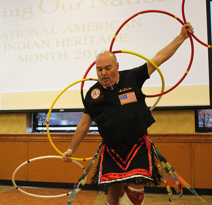 Peter Giove of the Mohawk Tribe performs a traditional hoop dance