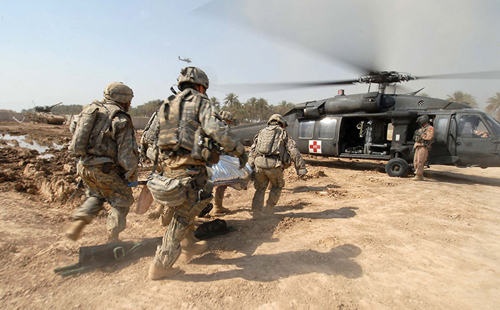 U.S. Army Soldiers transport a trauma victim to a U.S. Army medical helicopter in Tarmiyah, Iraq, Sept. 30, 2007