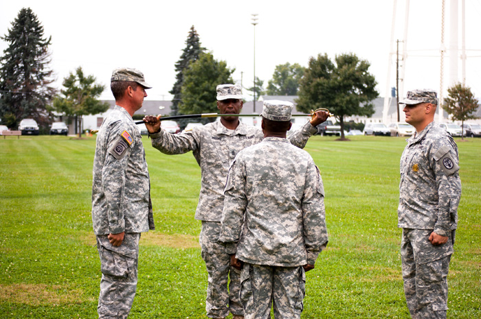 Sgt. Maj. Michael L. Brooks inspects the Noncommissioned Officers' Sword