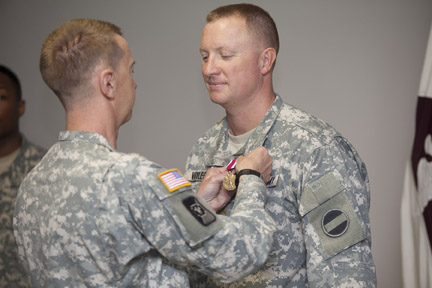 Maj. Matthew Voyles receives Meritorious Service Medal
