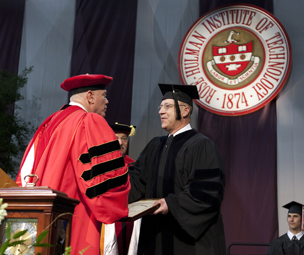Maj. Gen. James Gilman receiving his honorary doctorate in Engineering