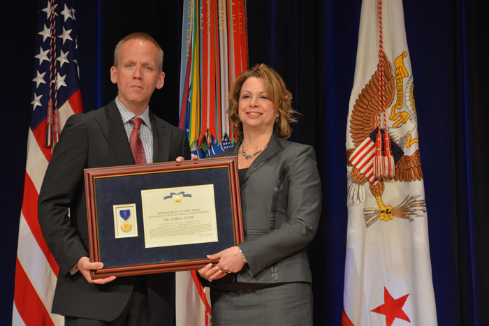 Dr. Lori A. Loan receives the Decoration for Exceptional Civilian Service award