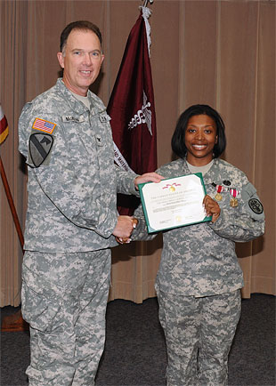 Sgt. 1st  Class Tamekia Carter, the departing Senior NCO Command Advisor at the U.S. Army Aeromedical Research Laboratory